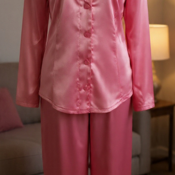 Size 18 Long Sleeve Satin Pajamas. Long sleeve satin pajamas. Button down top and flowy wide leg pants.